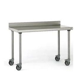Table inox TOURNUS 1200x700 sur roulettes adossée