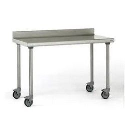 Table inox TOURNUS 1400x700 adossée sur roulettes sans étagère